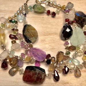 SOLD. Sterling silver and multi gem bracelet.